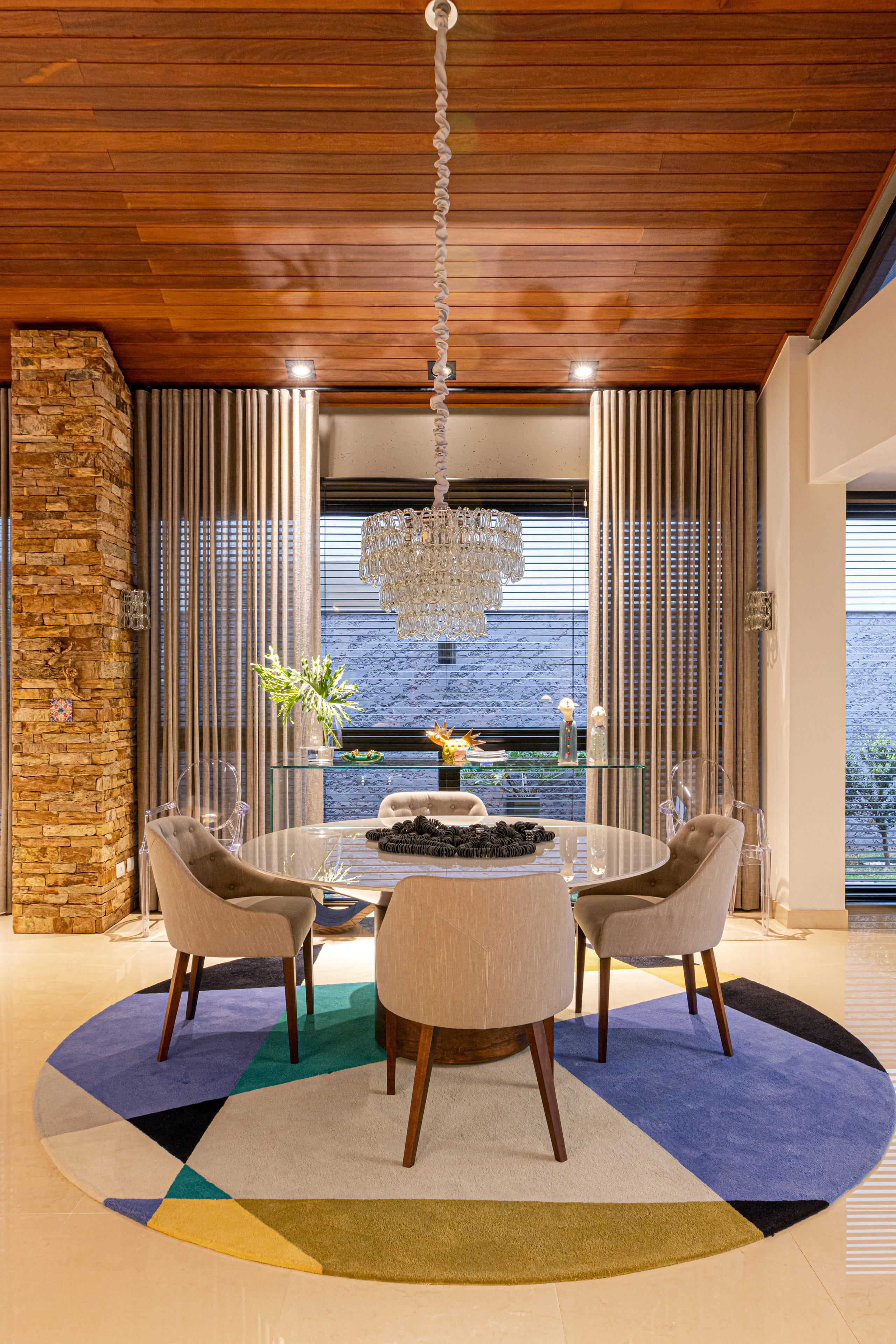 Well-lit dining room in a high-end interior.